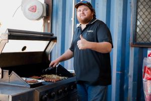 Simon cooking a bbq