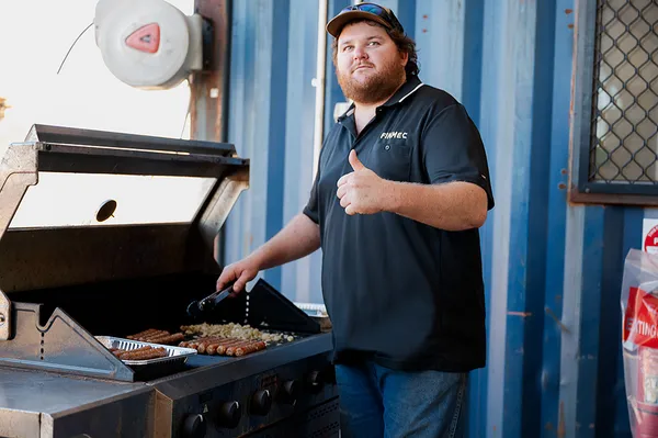 Simon cooking a bbq