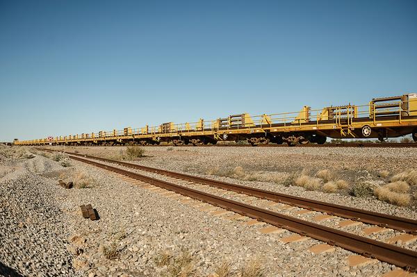 Train tracks with the train going past