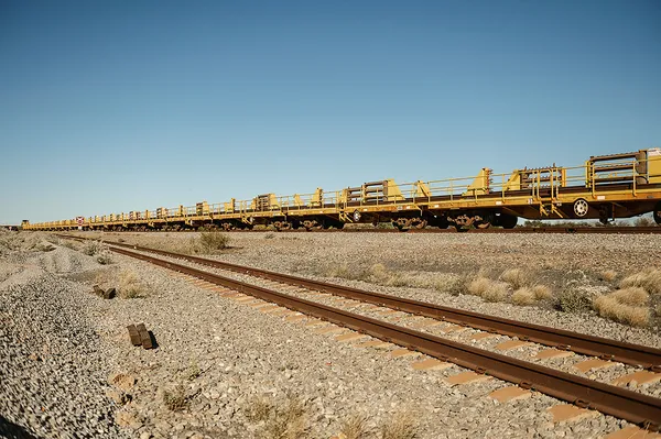 Train tracks with the train going past