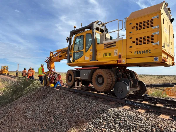 Flashbutt welder in use on a train line 