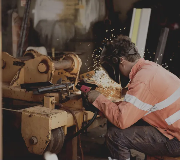 Finmec employee welding 