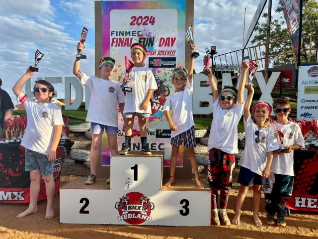 Kids on the BMX podium with their trophies